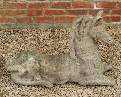 Lot 1426 - A cast reconstituted stone garden sculpture