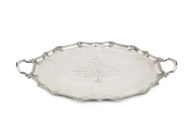 Lot A George V silver twin handled tea tray, of...