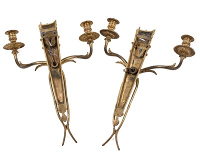 Lot 506 - A pair of gilt brass French Neoclassical-style twin-branch wall lights
