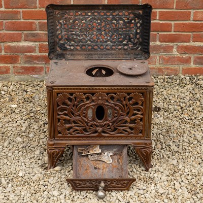 Lot 1455 - A French brown enamel stove