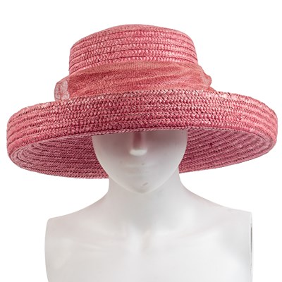 Lot 361 - A pink straw hat with a big straw bow,...