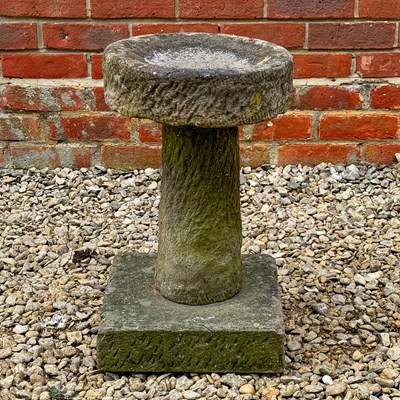 Lot 1463 - A rough-cut sandstone bird bath