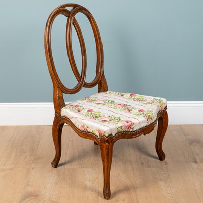 Lot 307 - A 19th century French walnut low side chair