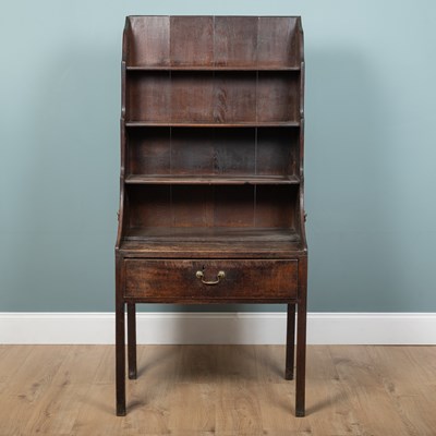 Lot 1110 - A George III oak bookcase