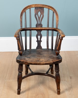 Lot 1146 - An antique child's Windsor armchair