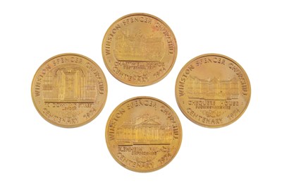 Lot A set of four 22ct gold limited edition...