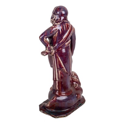 Lot 237 - Sang de boeuf model of a figure on a toad...