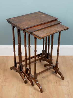 Lot 517 - A nest of three 19th century mahogany occasional tables