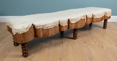Lot 351 - A Victorian pine-framed shaped banquete