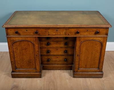 Lot 502 - An Victorian oak pedestal desk