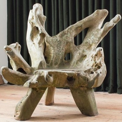 Lot 1517 - An early 20th ncentury organic, weathered root seat