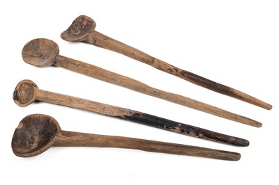 Lot 1130 - Four primitive carved wood spoons