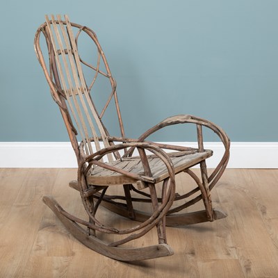Lot 1223 - A 1940s American Folk Art steam-bent twigwork rocking chair