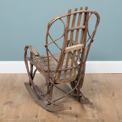 Lot 1223 - A 1940s American Folk Art steam-bent twigwork rocking chair