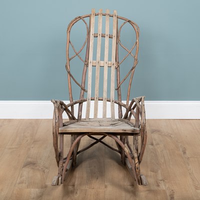 Lot 1223 - A 1940s American Folk Art steam-bent twigwork rocking chair
