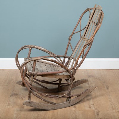 Lot 1223 - A 1940s American Folk Art steam-bent twigwork rocking chair