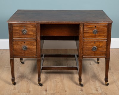 Lot 385 - An unusual George III mahogany writing table
