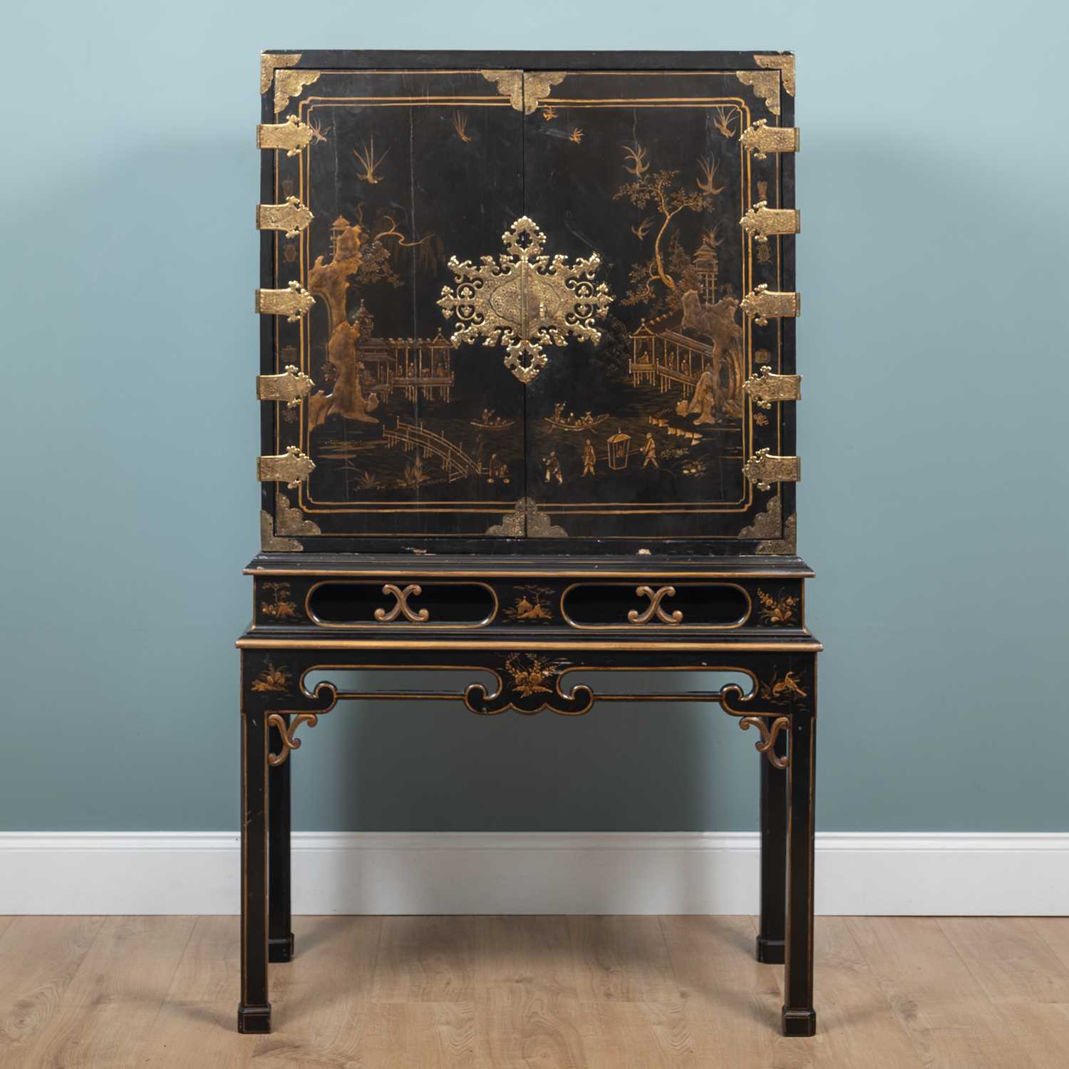 Lot 93 - A George I Japanned and engraved gilt brass mounted cabinet