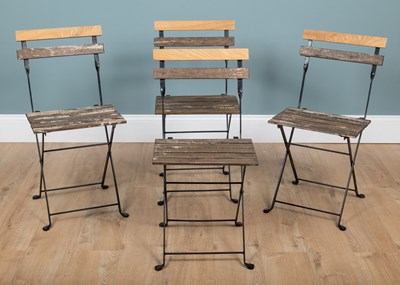 Lot 1333 - A group of four café chairs