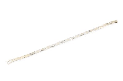 Lot 68 - A stone set fancy-link bracelet, centred with...