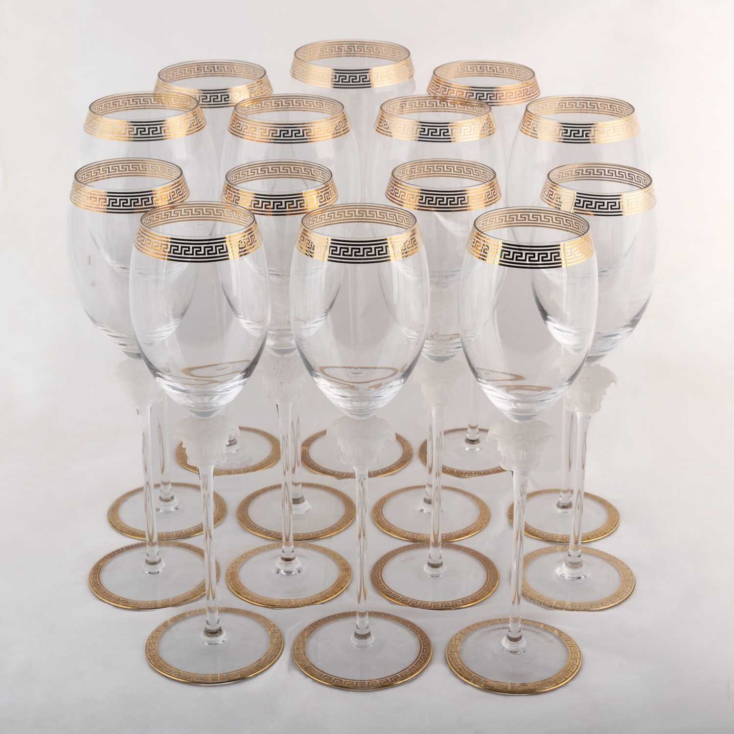 Lot 113 - A set of twelve Rosenthal for Versace 'Medusa d'Or' cystal wine glasses