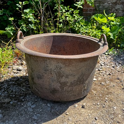Lot 1474 - A cast iron cauldron or copper