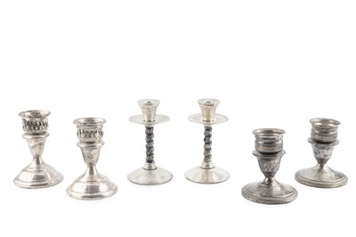 Lot 162 - A pair of American silver dwarf candlesticks,...