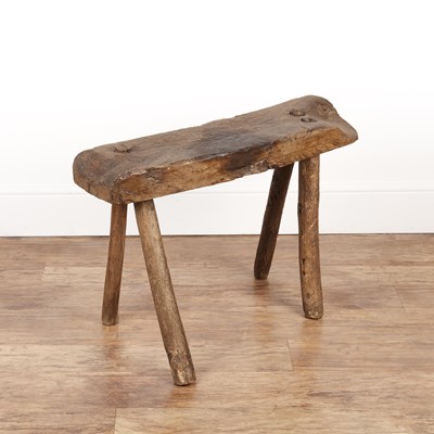 Lot 54 - Primitive pig bench Or stool, of pegged...