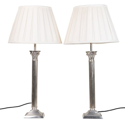 Lot 144 - A pair of white metal table lamps