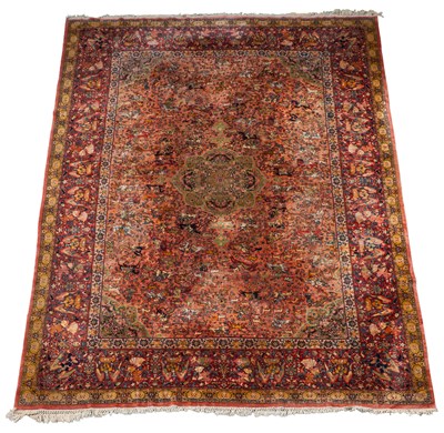 Lot 1310 - An early 20th century hand-woven Kerman carpet