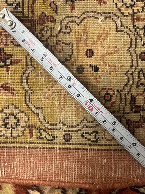 Lot 160 - An early 20th century hand-woven Kerman carpet