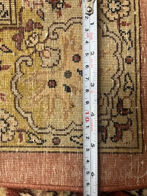 Lot 160 - An early 20th century hand-woven Kerman carpet