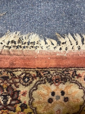 Lot 160 - An early 20th century hand-woven Kerman carpet