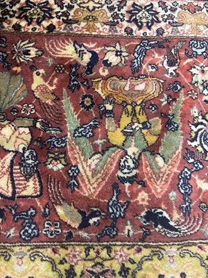 Lot 160 - An early 20th century hand-woven Kerman carpet
