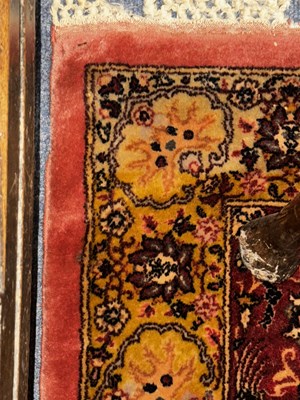 Lot 160 - An early 20th century hand-woven Kerman carpet
