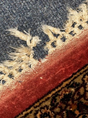 Lot 160 - An early 20th century hand-woven Kerman carpet