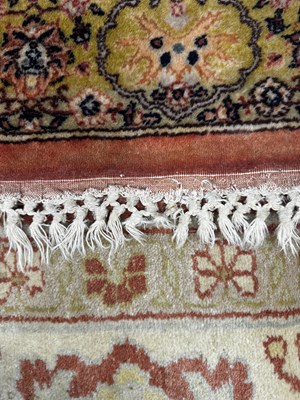 Lot 160 - An early 20th century hand-woven Kerman carpet