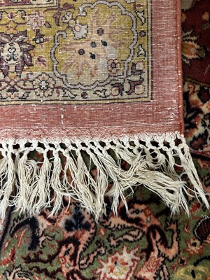 Lot 160 - An early 20th century hand-woven Kerman carpet