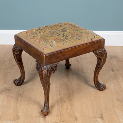 Lot 418 - A George III walnut stool