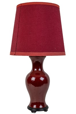 Lot 212 - A red-glazed table lamp