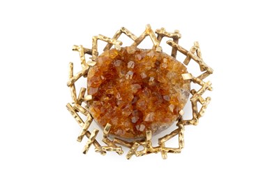 Lot 66 - A geode panel brooch, with textured abstract...