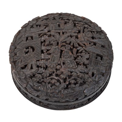 Lot 339 - A 19th century Chinese carved tortoiseshell circular snuff box