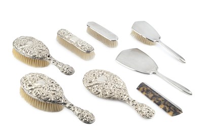 Lot 177 - An Edwardian silver backed four piece dressing...