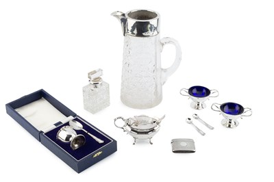 Lot 179 - A pair of Edwardian silver twin handled salts...