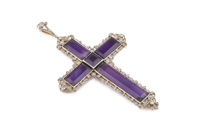 Lot An amethyst and diamond cross pendant,...
