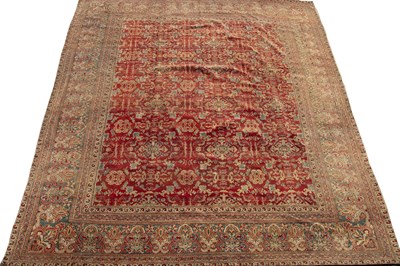 Lot 329 - An antique Agra carpet with a banded...