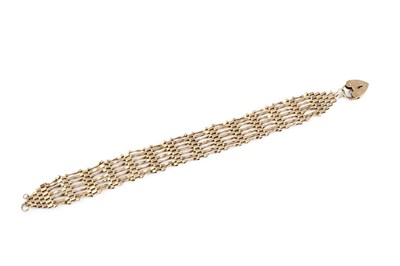 Lot 15 - A 9ct gold gate-link bracelet, with padlock...