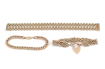 Lot 73 - A 9ct gold strap bracelet, of part-textured...