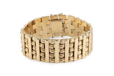 Lot 18 - A fancy-link strap bracelet, of part-textured...