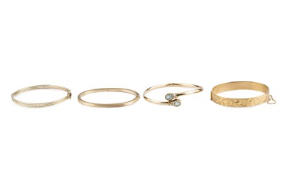 Lot 72 - A 9ct gold bangle, of hinged oval form, with...
